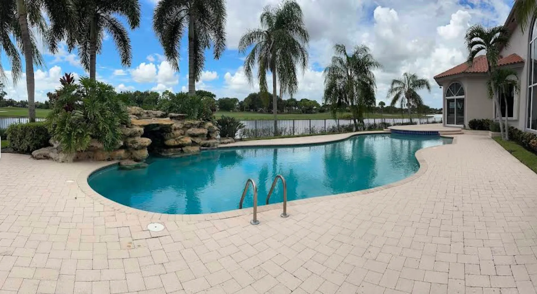 Rock waterfall, spa, lake view — and we keep every inch of it clean